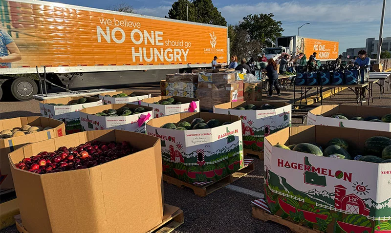 Hundreds of veterans and their families received both fresh food and non-perishables during the Heroes Helping Heroes event in Pueblo. UCHealth volunteers packed boxes of food on their days off before the event. Local farmers stepped up to donate chiles, apples and watermelons, while scores of volunteers and non-profit leaders worked to host the largest food drive for veterans in Colorado. Photo by Adam Uhernik, courtesy of Care and Share Food Bank.