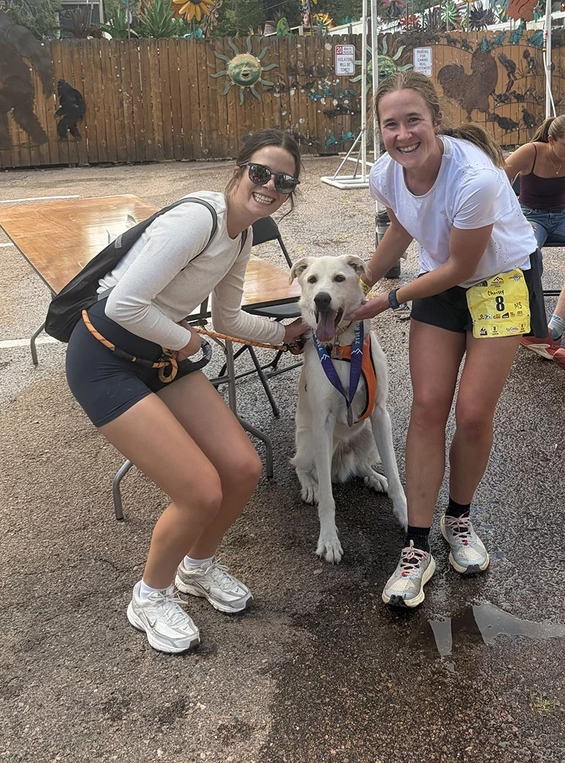 Amy Lofgren, left, and her dog, Birch, met Chrissy Lofgren, right, at the finish line of the Pikes Peak Marathon. Photo courtesy of Amy Lofgren.