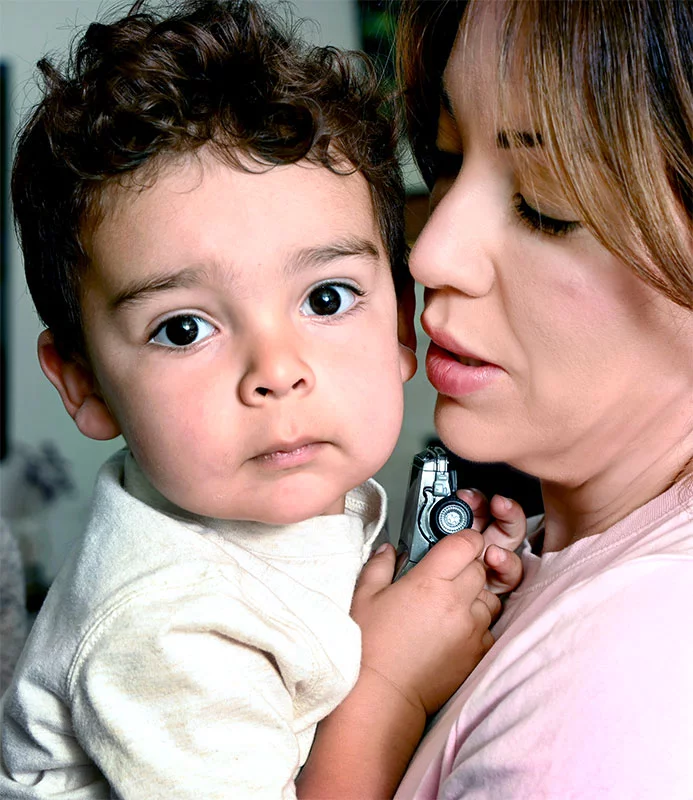 Kristine holding her son. “My young son is my priority,” Ortiz said. “Surgery is not the worst case. Getting sick is the worst case.” Photo by Sonya Doctorian, UCHealth.
