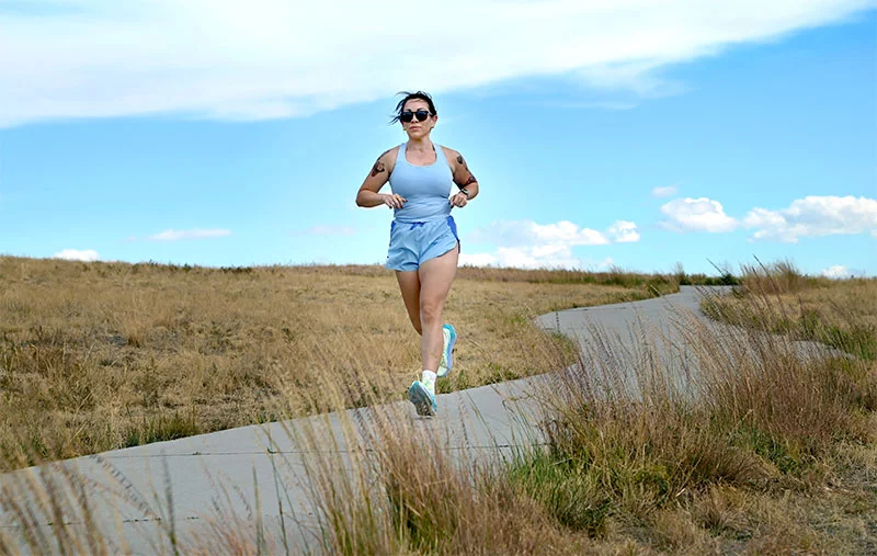 Kristine Ortiz took up running half marathons last September, just before she received her genetic test results. So far, she has finished three. She’s more committed to running than ever and is determined to go into her January surgery feeling strong and optimistic. Photo by Sonya Doctorian, UCHealth.