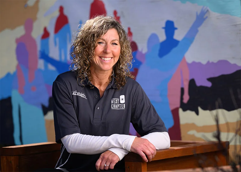 Lori Montano runs UCHealth’s co-response program in southern Colorado, which matches UCHealth behavioral health providers with law enforcement officers to respond to calls for service. Some of those calls involve veterans who are in crisis, or their family members. She raised her family as a military spouse. Photo by Mark Reis, for UCHealth.