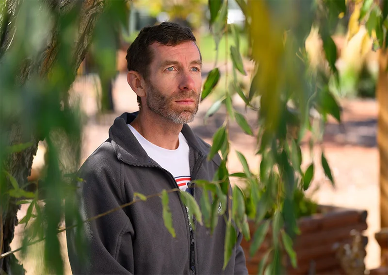Sean Sindler, who served 20 years in the U.S. Air Force, left the service with a medical discharge after mental health challenges. He now advocates on behalf of Next Chapter and other partner organizations that supported him after he left the military. Photo by Mark Reis, for UCHealth.